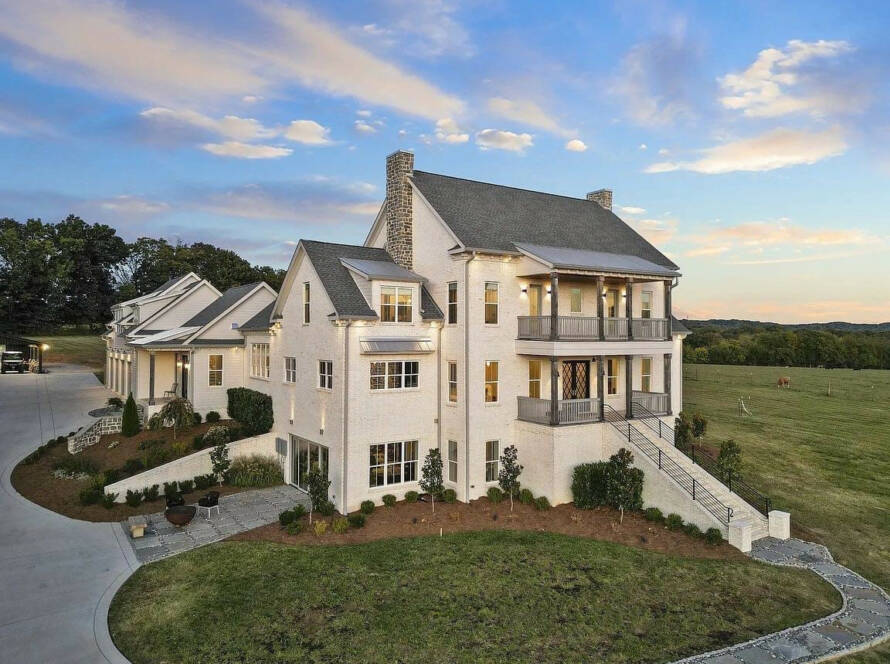 white brick custom home with land